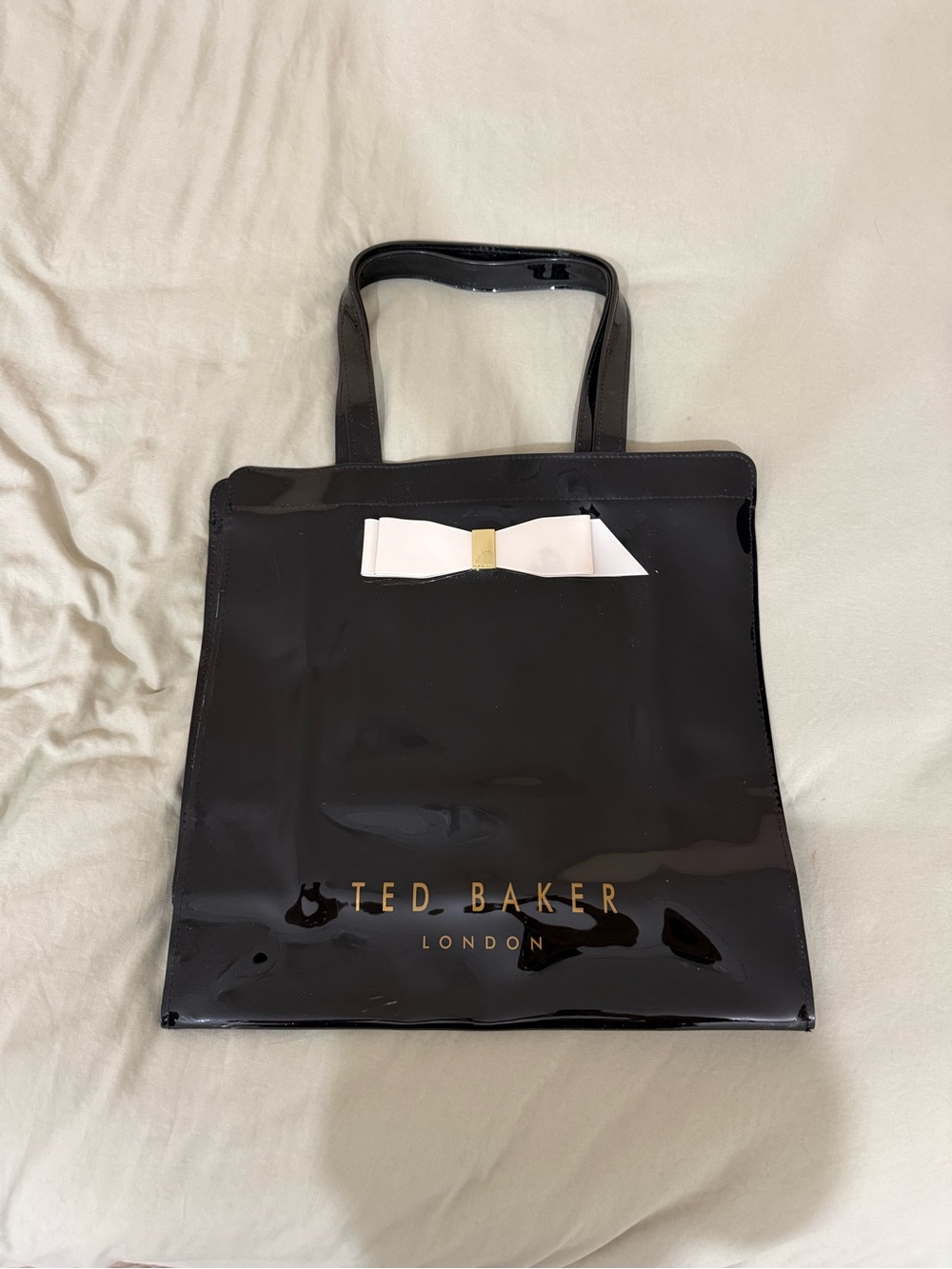 Ted Baker Black Patent Messenger Bag with White Bow